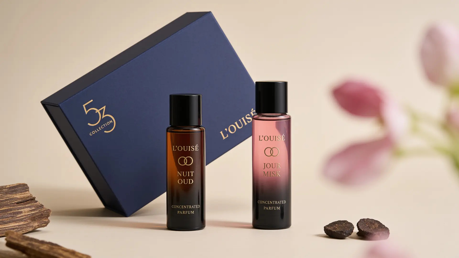 Nuit Oud and Jour Misk in front of the closed coffret